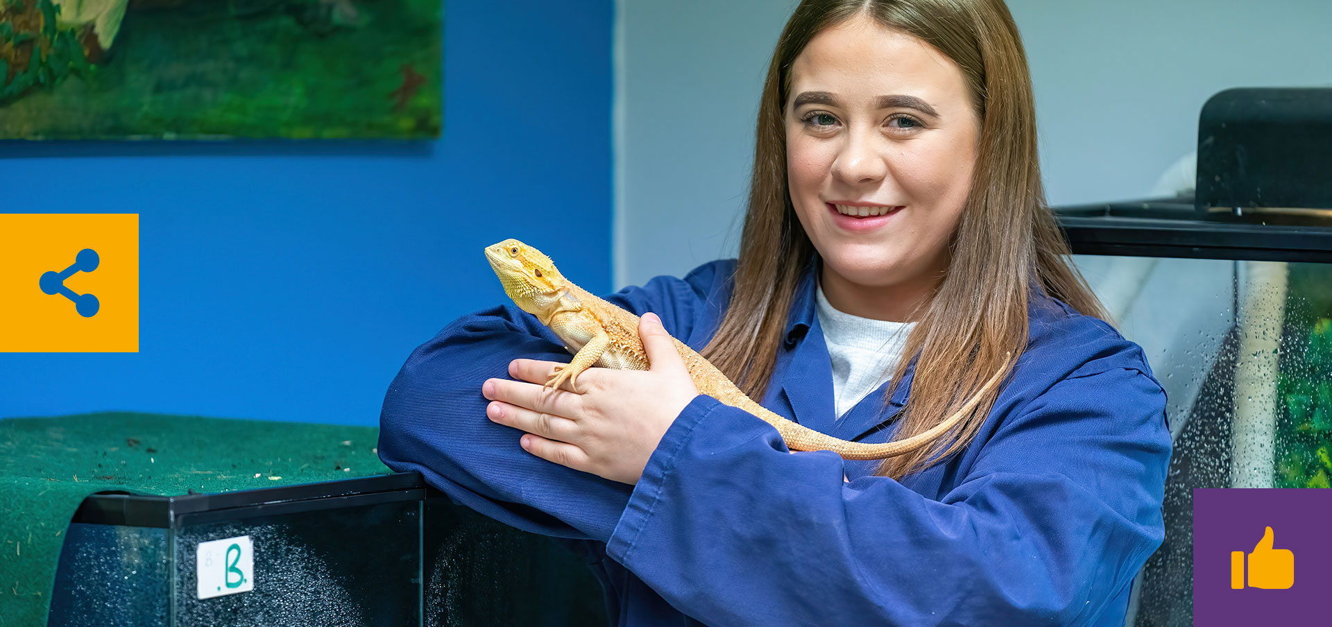 Animal care learner, Nina, holding a lizard